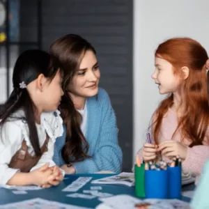 medium-shot-kids-sitting-table-w